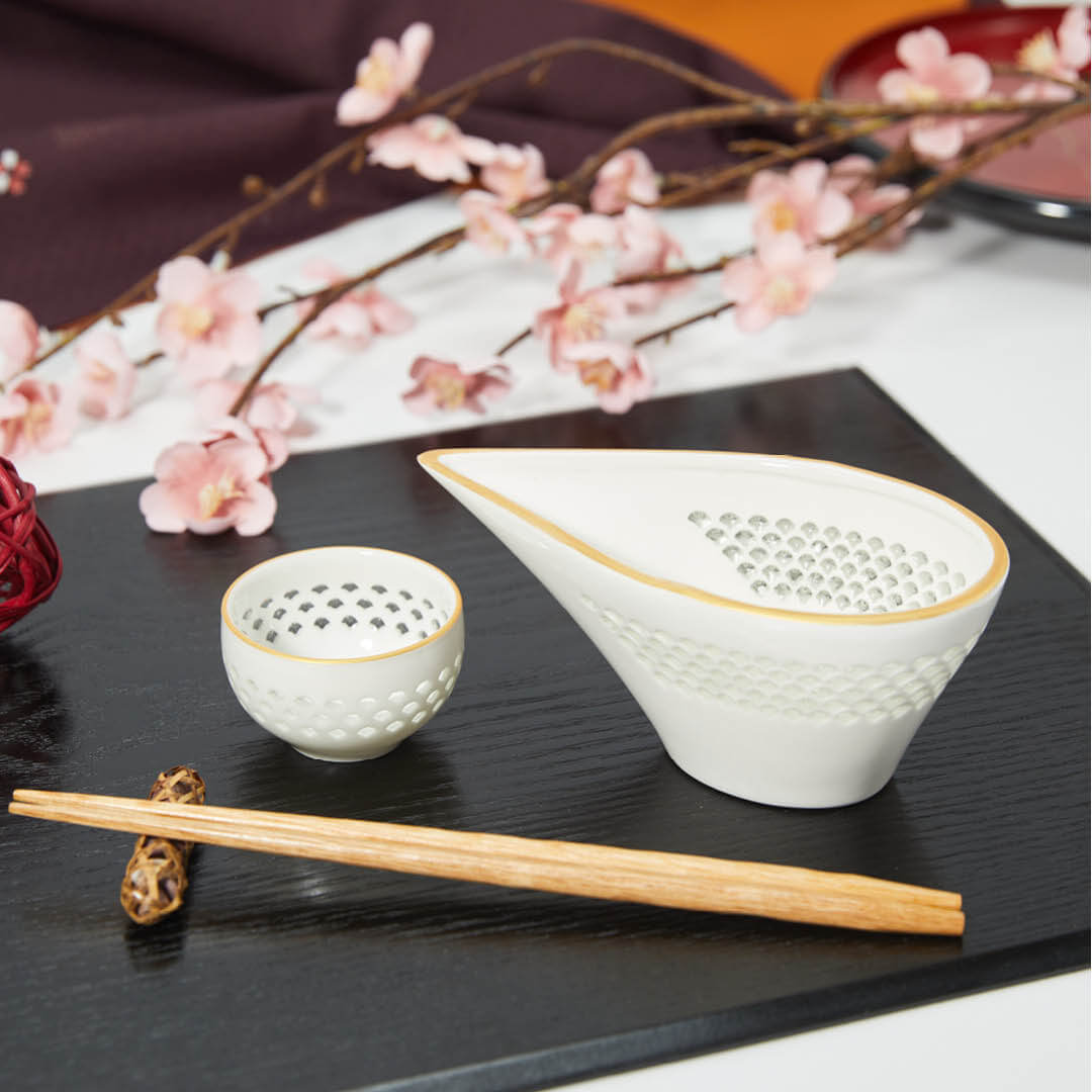 Hotarude Cup With Mica Gold Rim, on a table